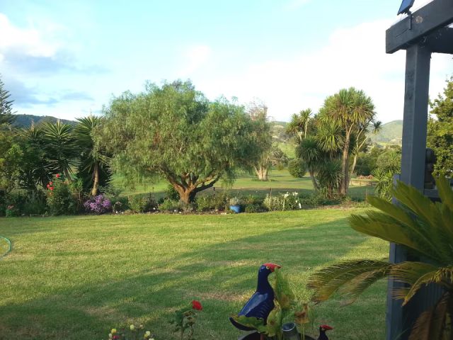 A view to the golf course from our rear lawn which is accessible to guests